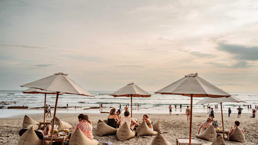 Visitors relaxing at Canggu Beach in Bali