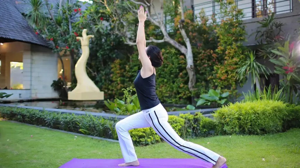 Yoga session in a tropical garden in Umalas Bali