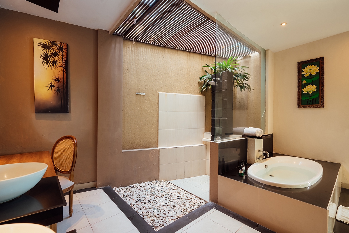 En-suite bathroom with freestanding oval bathtub and double vanity, The Bidadari