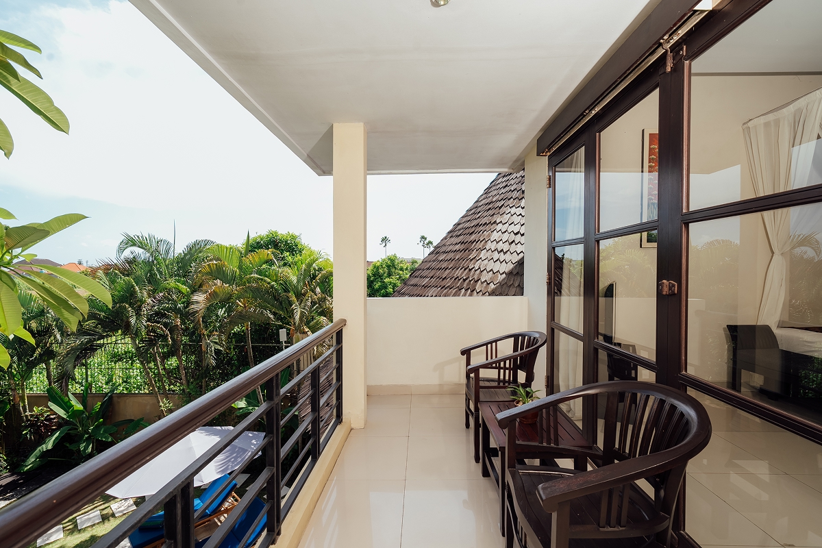 Two-storey villa interior with upper-floor dining set and large windows, The Bidadari