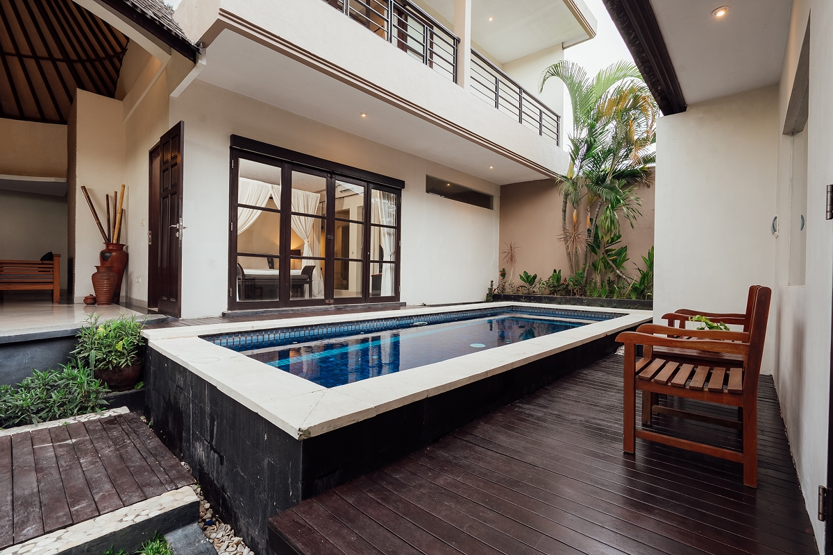 Private pool and deck beside a villa with covered terrace, The Bidadari