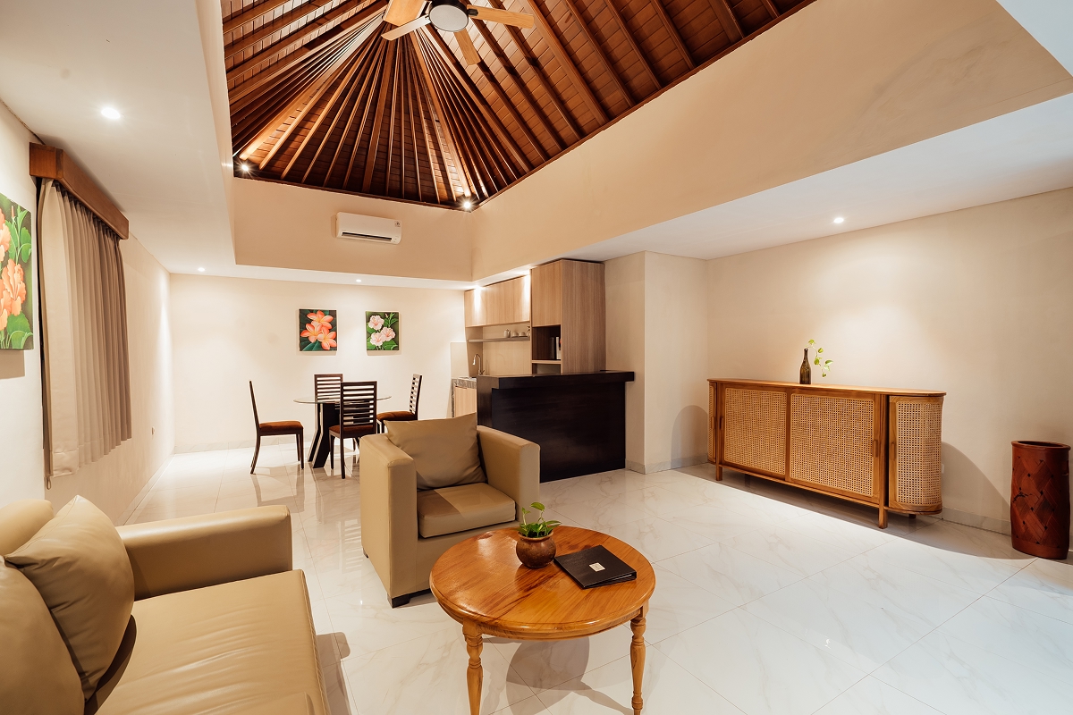 Villa living and dining area with sofa and wooden furniture, The Bidadari