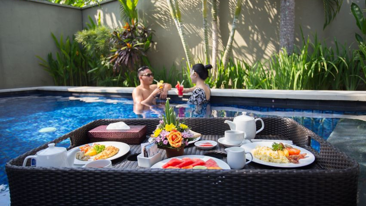 Floating breakfast tray on a villa's private pool, The Bidadari, Bali