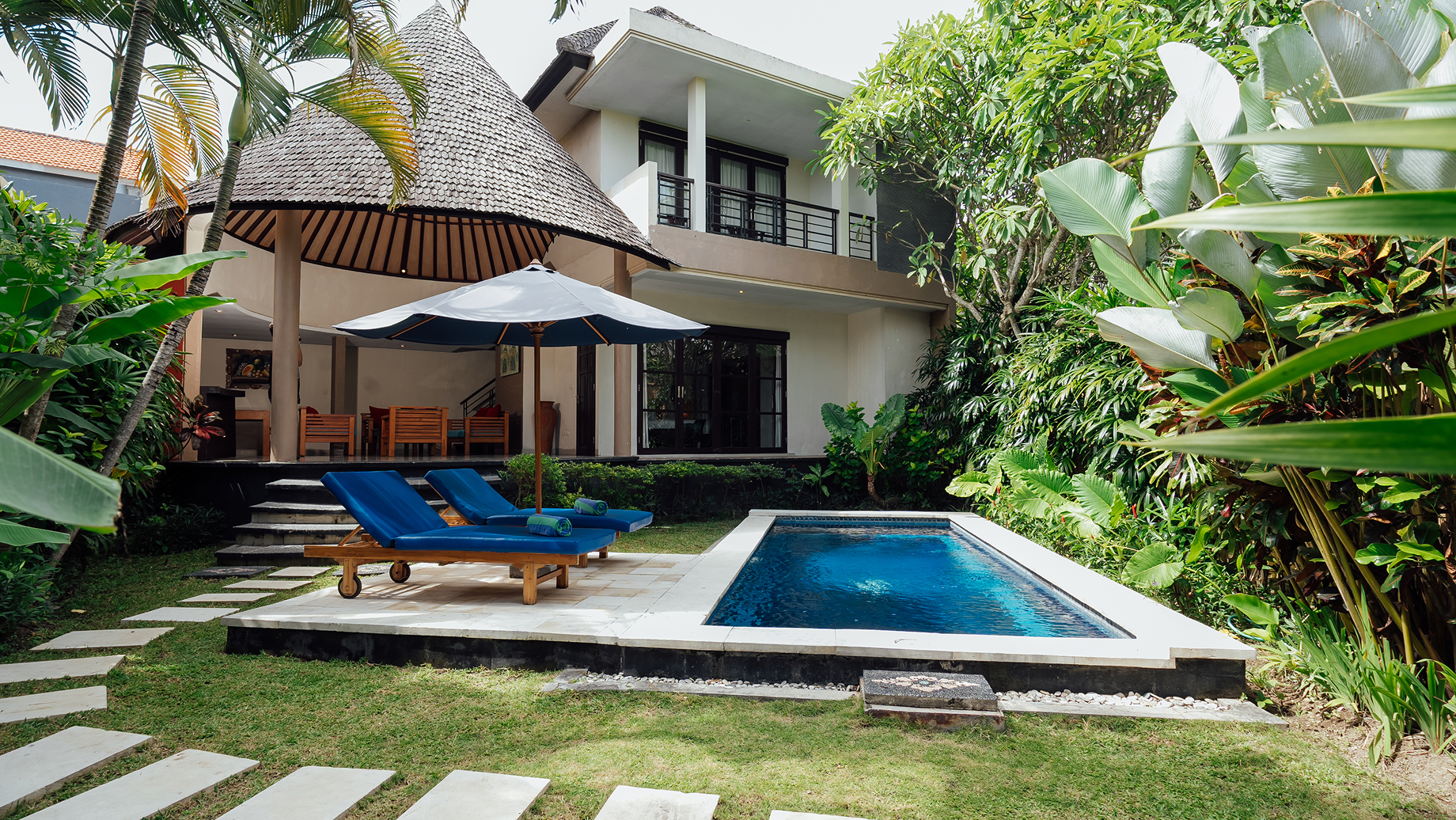 Two-bedroom pool villa exterior with private pool and tropical garden, The Bidadari, Bali