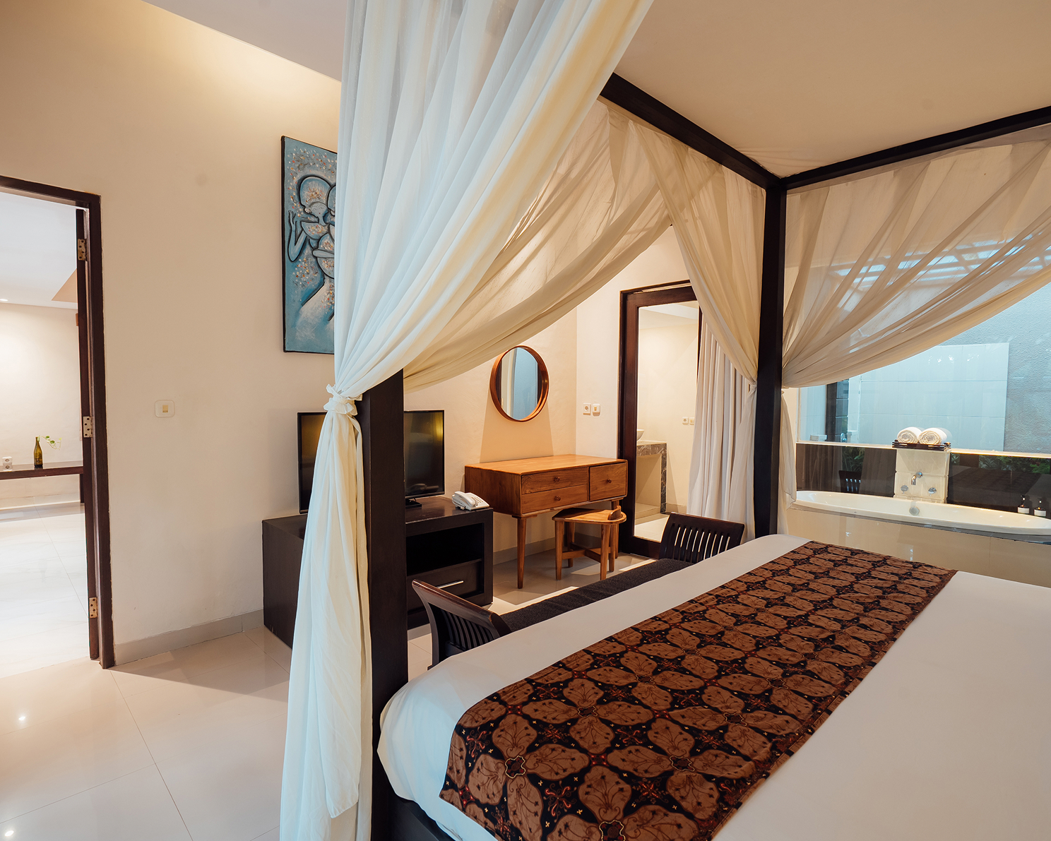 Canopy bed in a villa bedroom, The Bidadari