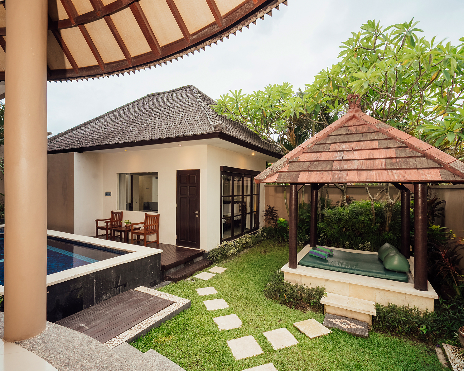 Villa exterior with thatched pavilion, The Bidadari