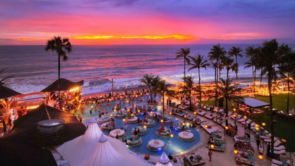Busy Canggu beach club at sunset